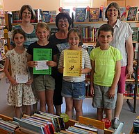 Die vier Kinder, die am Vorlesewettbewerb teilnahmen. rei Mädchen und ein Junge